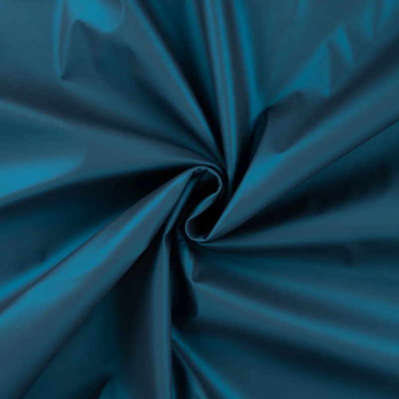 Tissu imperméable - pétrole métallisé