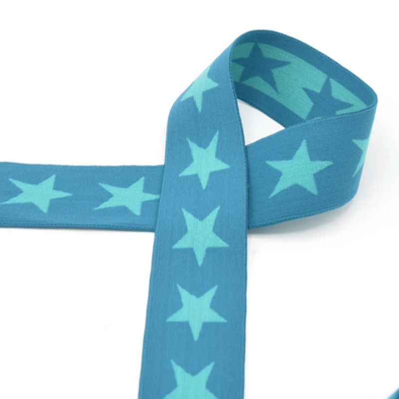 Elastic ribbon with stars 40mm mint on teal