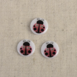 Bouton - Coccinelle blanche