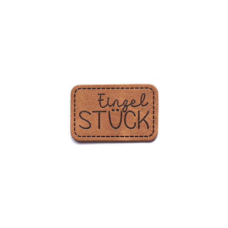 XXL artificial leather label - single piece brown XXL artificial leather label - single piece brown