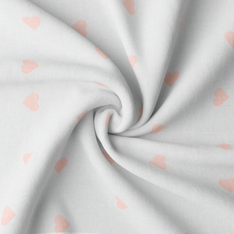 Cotton - hearts apricot on off-white