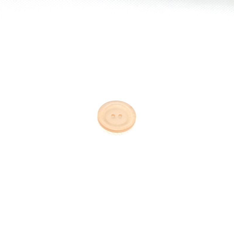 Bouton à 2 trous 20 mm - abricot transparent