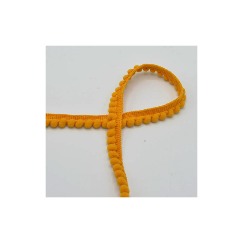 Pompomborte - 6 mm moutarde (qt) Pompomborte - 6 mm moutarde (qt)