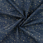 coton tissé - Mélange d'étoiles de Noël or sur bleu marine