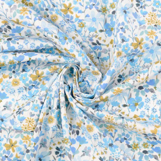 Coton - champ de fleurs bleu sur fond naturel