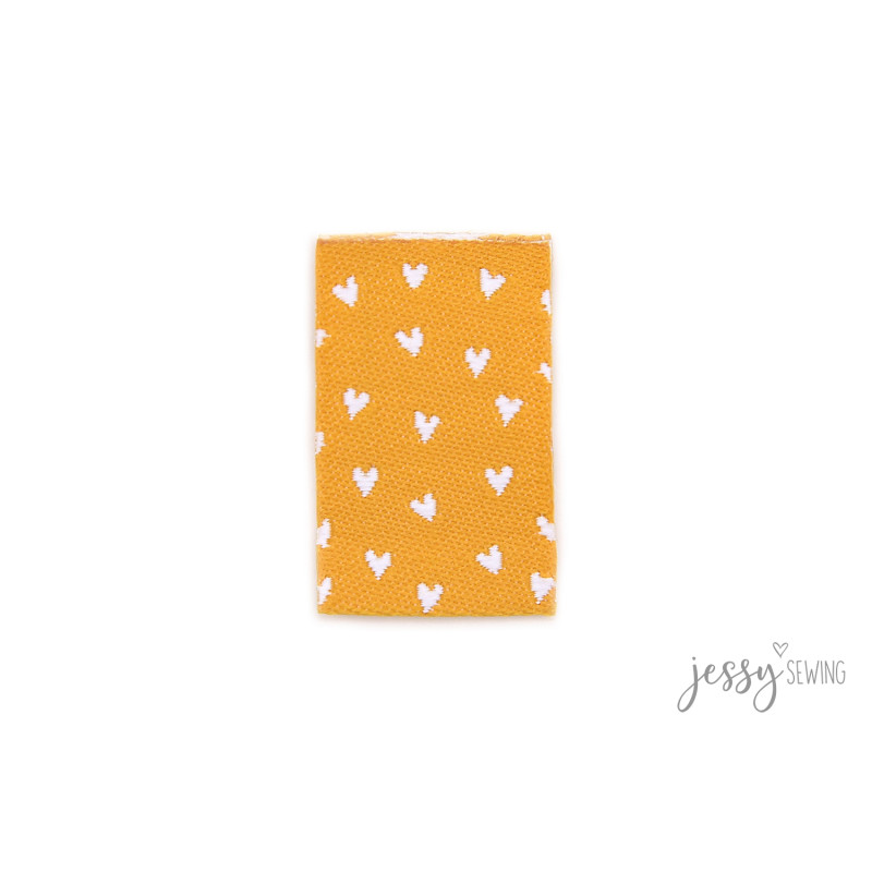 Woven label - many hearts mustard yellow