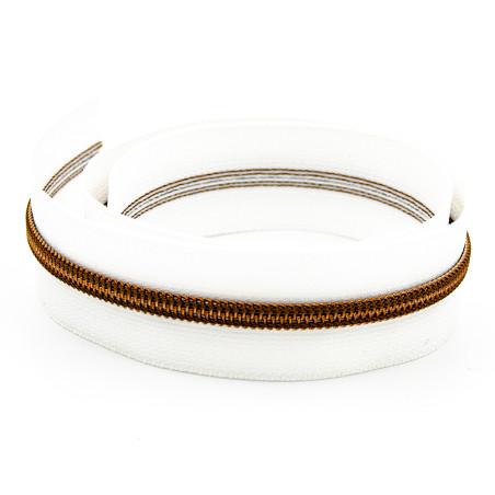 Endless zipper YKK 6mm metal white/antique brass