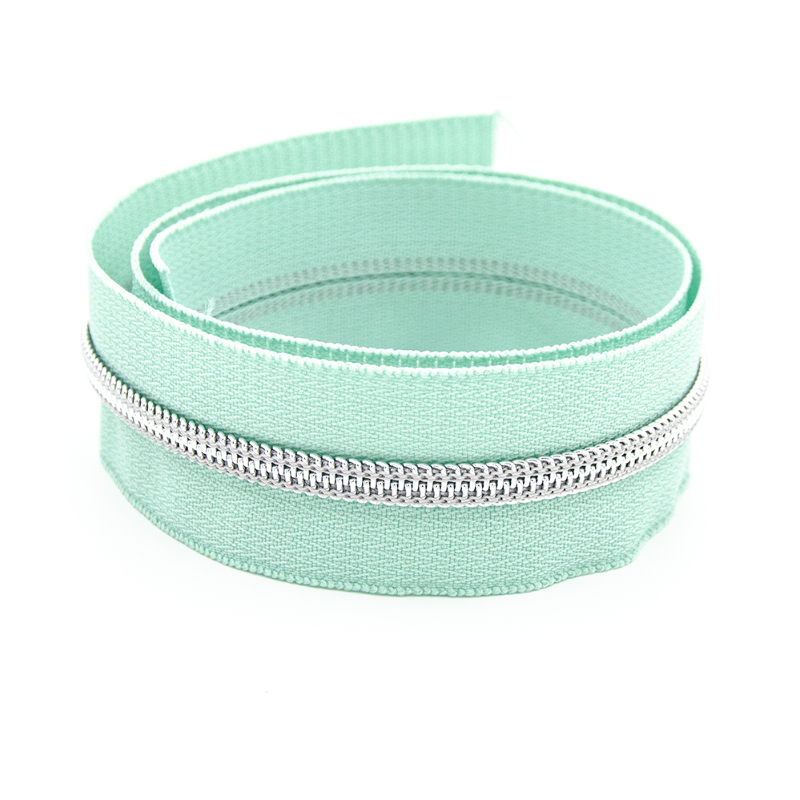 Fermeture éclair sans fin YKK 6 mm métal vert pastel/argent