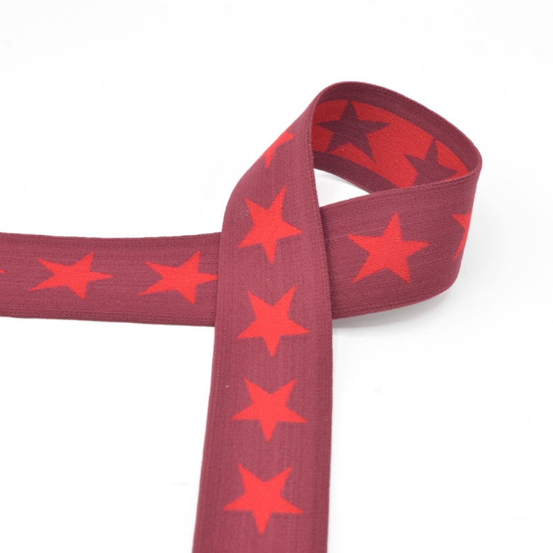 Elastic ribbon with stars 40mm red on bordeaux