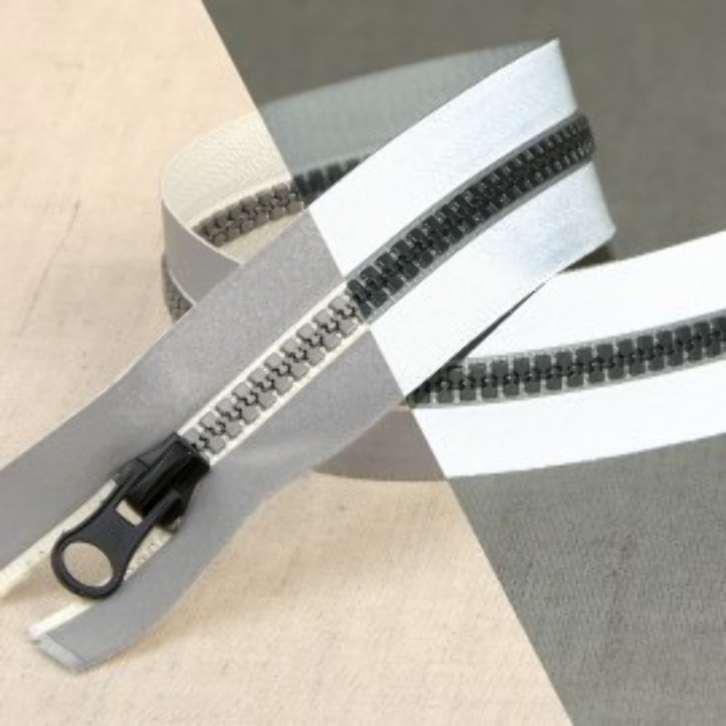 Trouser/pocket zipper - reflective, not divisible